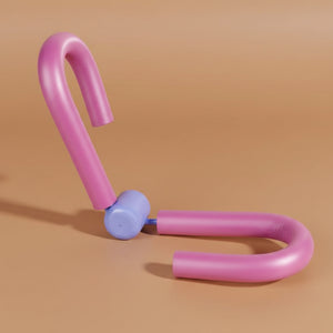 A thigh master-style exercise equipment with , pink foam-covered metal loops connected by a central blue cylindrical spring hinge 